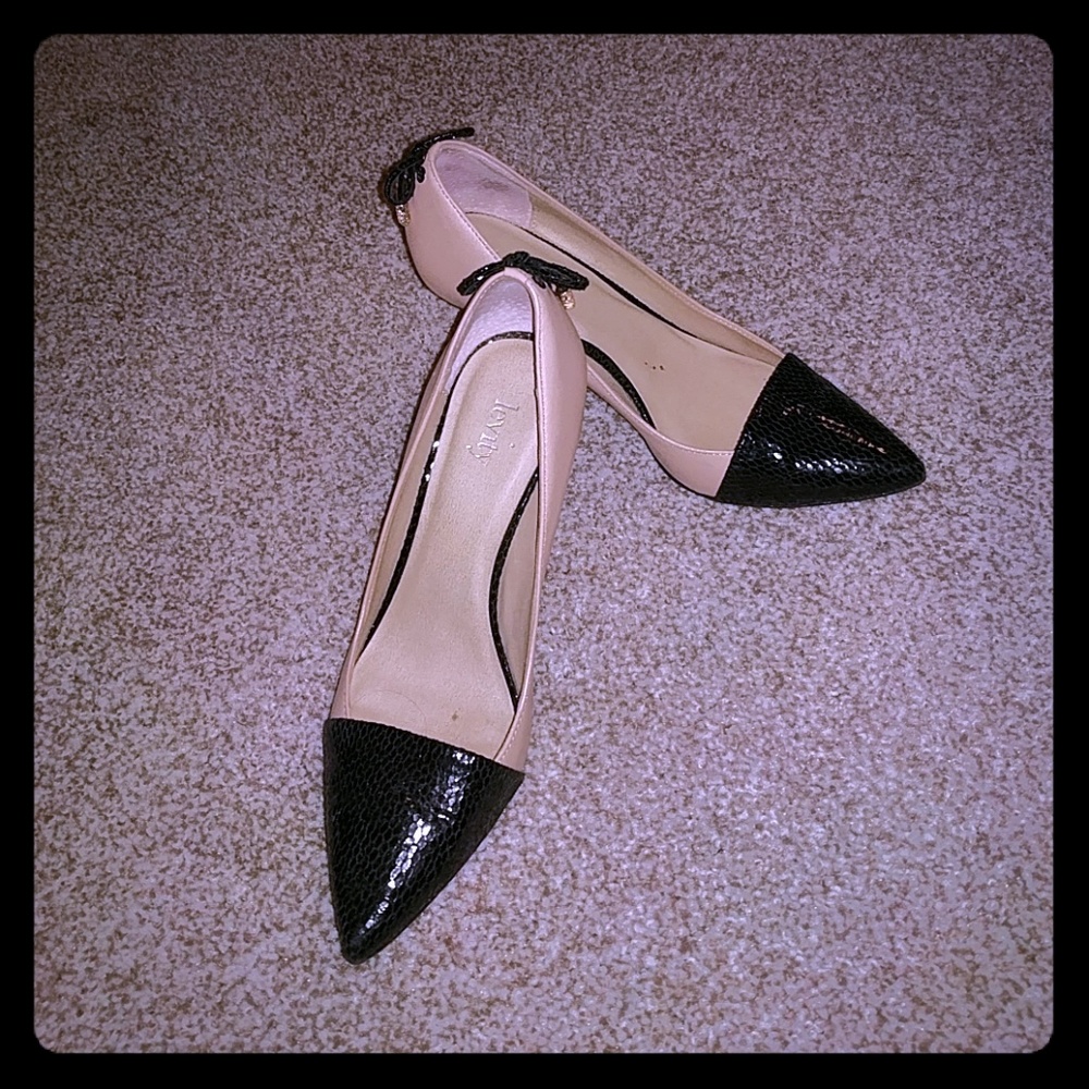 Tan and black pumps